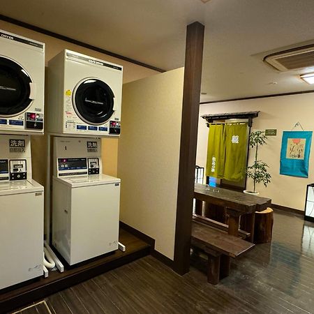 Shikishimaso Hotel Higashikawa Bagian luar foto