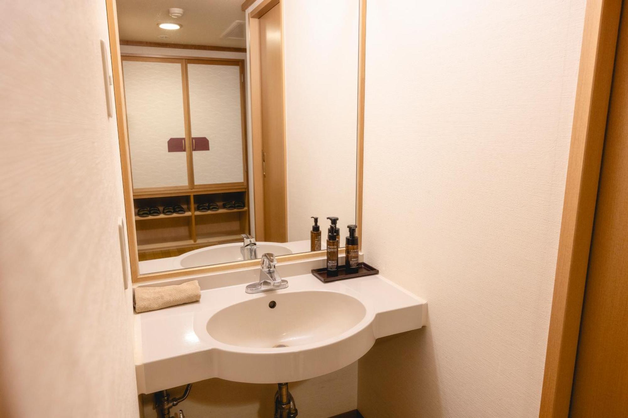 Shikishimaso Hotel Higashikawa Bagian luar foto