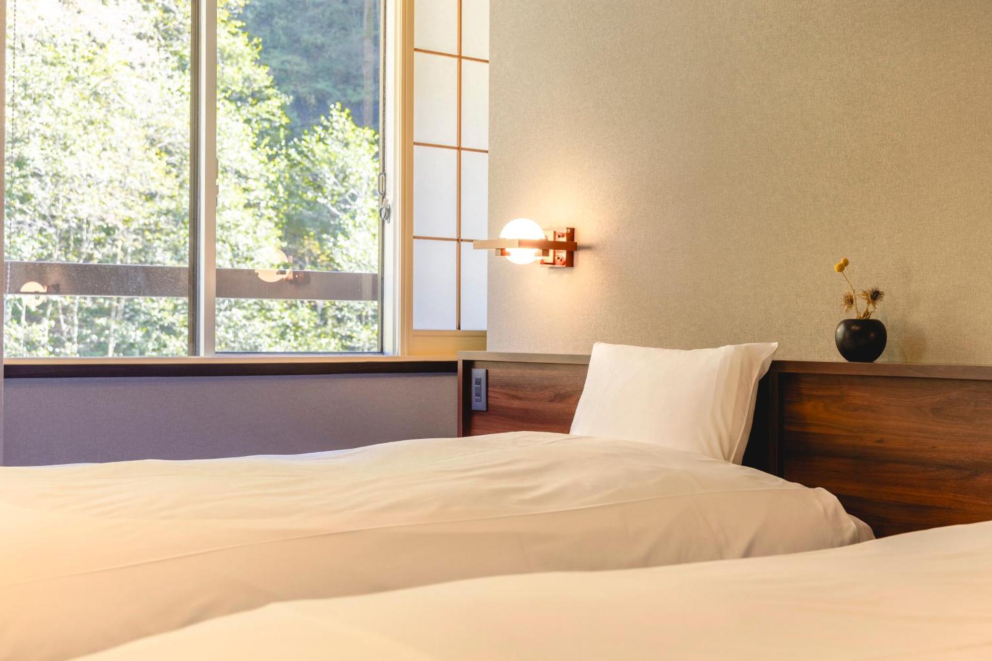 Shikishimaso Hotel Higashikawa Bagian luar foto