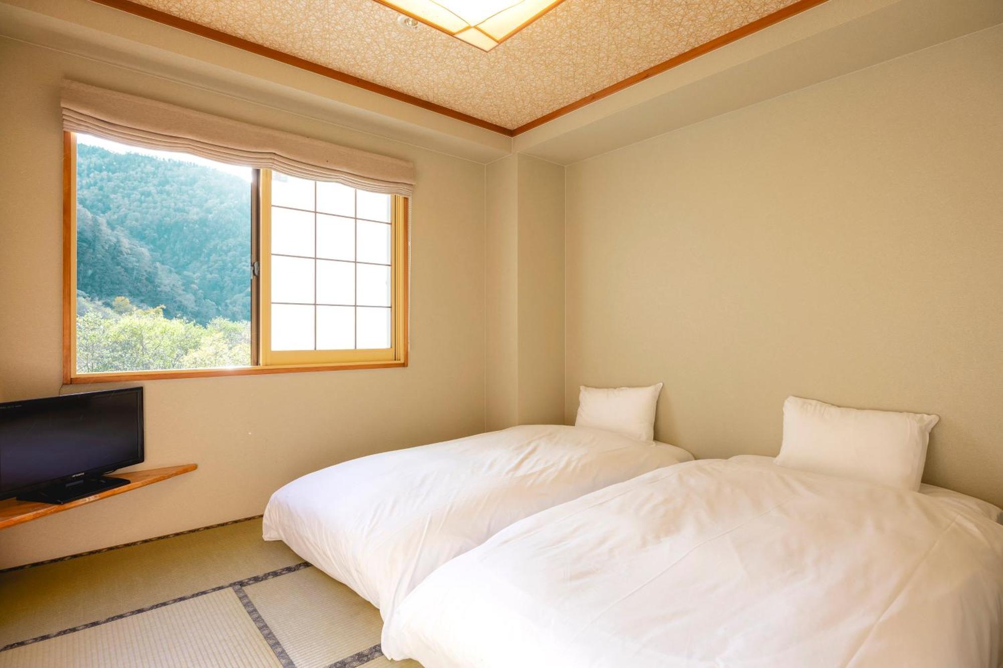 Shikishimaso Hotel Higashikawa Bagian luar foto